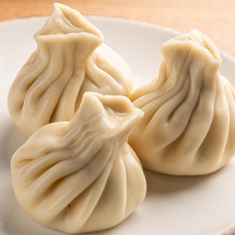 Хінкалі з сиром та зеленню